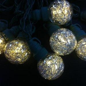 Warm white globe LED string light with tinsel